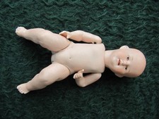 antike porzellanpuppen vor